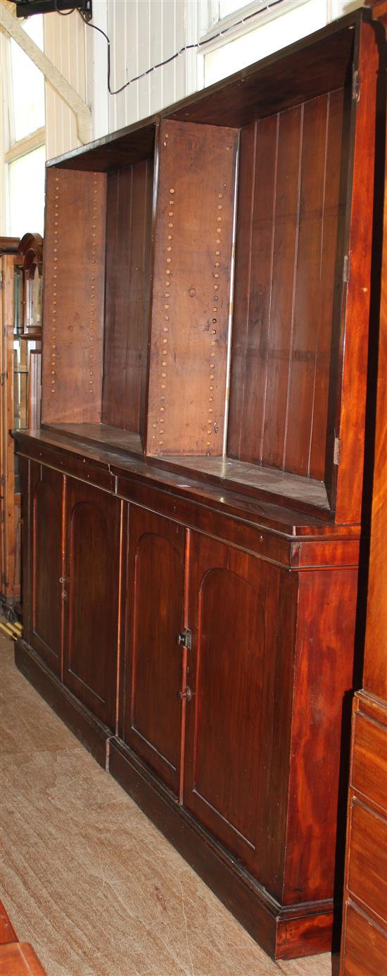 Large mahogany open  bookcase with cupboard below